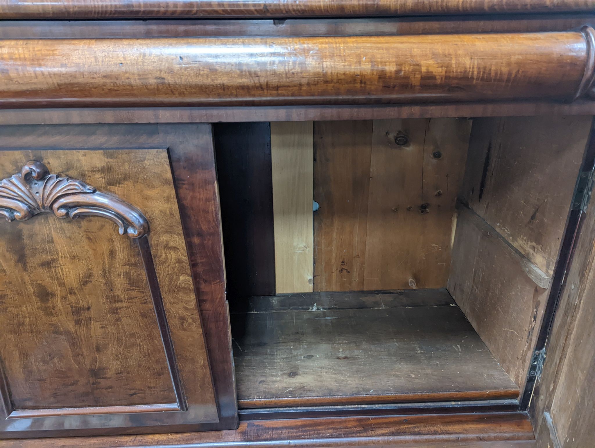 A mid Victorian mahogany bookcase, width 130cm, depth 54cm, height 230cm